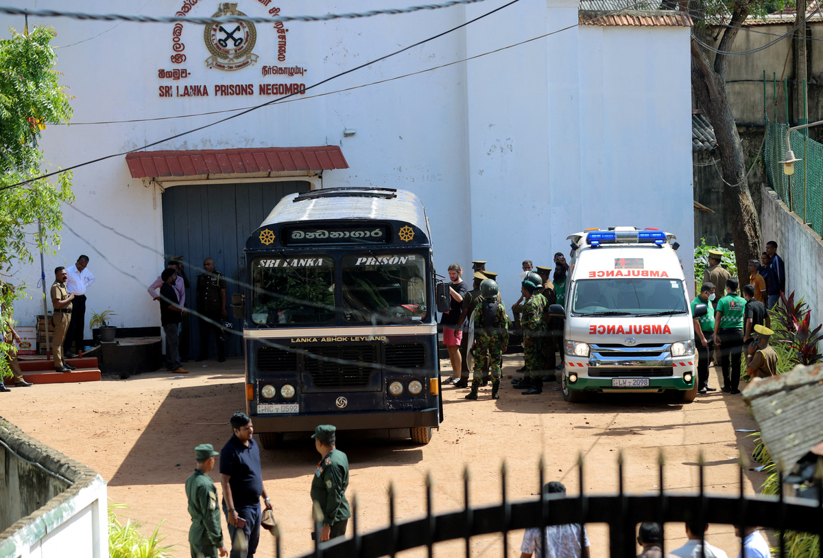 Prisoners board a bus to be transferred to another prison following clashes between two groups of inmates at Negombo Prison, in the coastal town of Negombo, Sri Lanka, July 6, 2026. REUTERS/Lahiru Harshana