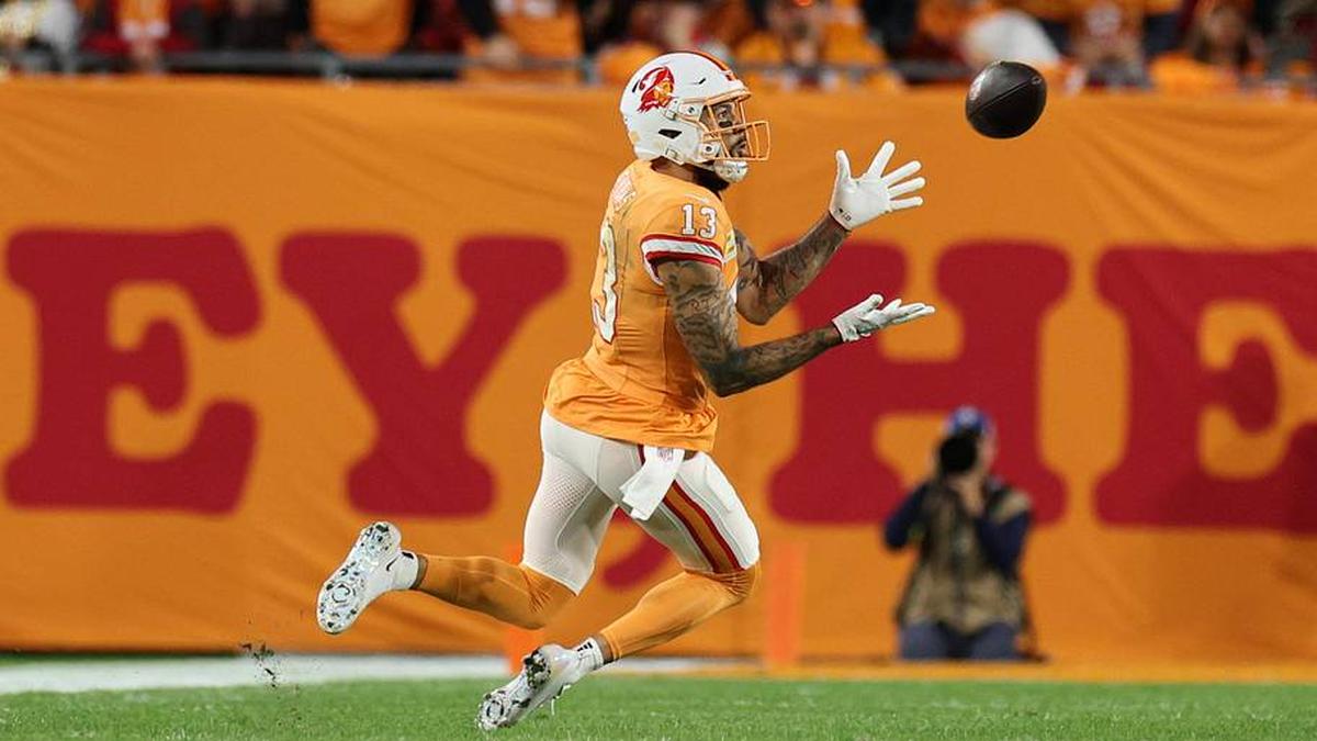  Dec 11, 2025; Tampa, Florida, USA; Tampa Bay Buccaneers wide receiver Mike Evans (13) catches a thirty-three yard pass thrown by quarterback Baker Mayfield (6) against the Atlanta Falcons during the second quarter at Raymond James Stadium. Mandatory Credit: Nathan Ray Seebeck-Imagn Images | Nathan Ray Seebeck-Imagn Images 