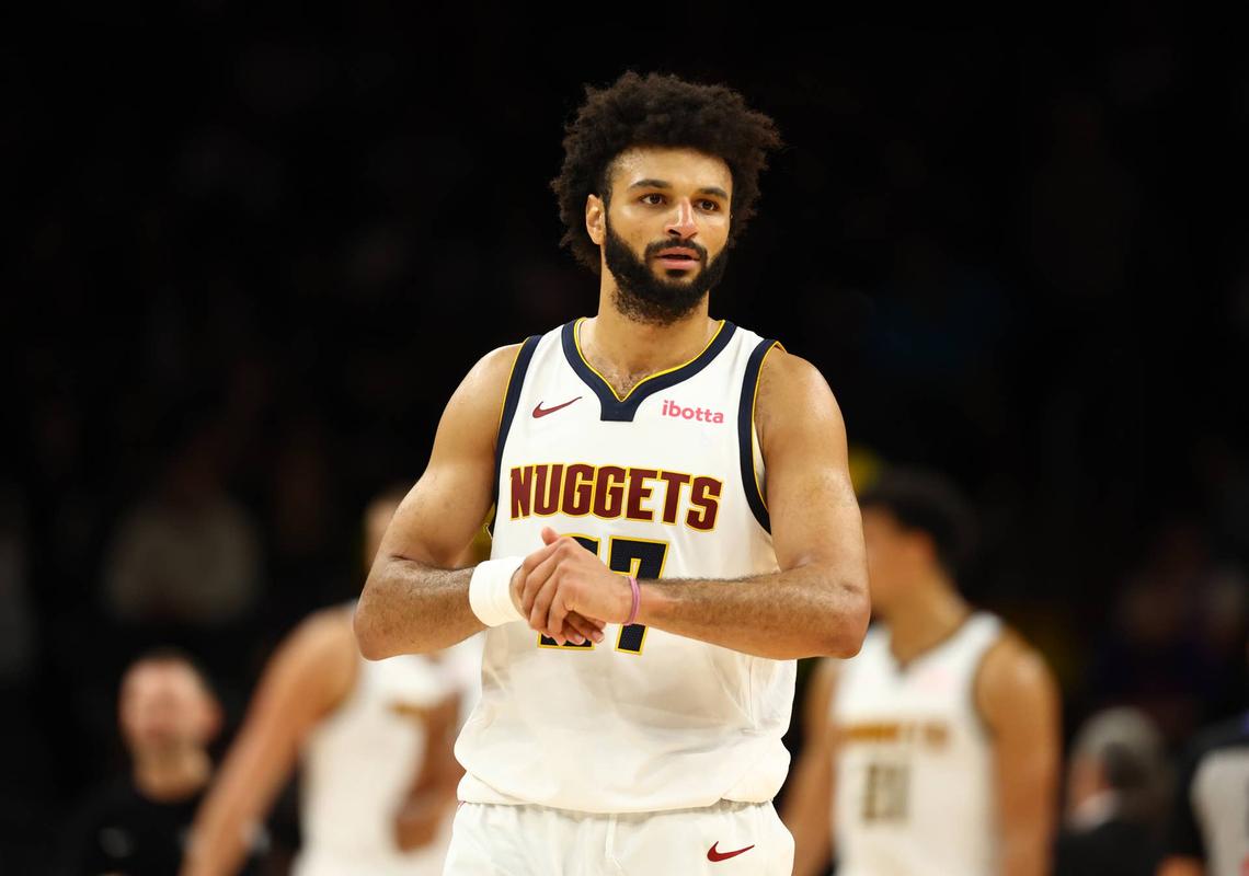  Denver Nuggets guard Jamal Murray (27) © Mark J. Rebilas-Imagn Images