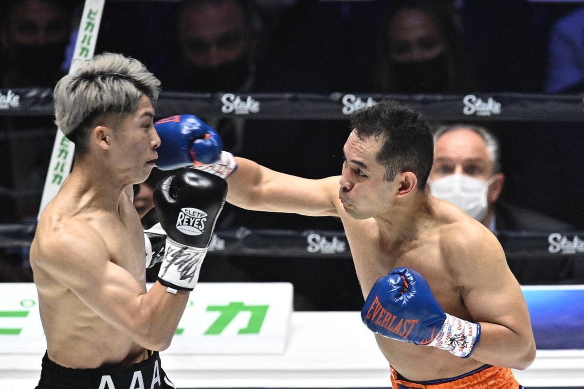  Naoya Inoue (L) fights against Nonito Donaire (R) during their Bantamweight unification boxing match at Saitama Super Arena in Saitama on June 7, 2022. PHILIP FONG/AFP via Getty Images