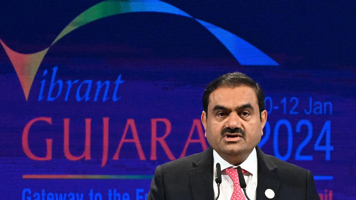 Chair of Indian conglomerate Adani Group, Gautam Adani addresses a gathering during the inaugural session of Vibrant Gujarat Global Summit 2024 on Jan. 10, 2024, in Gandhinagar, India. (Punit Paranjpe/AFP/Getty Images/TNS)