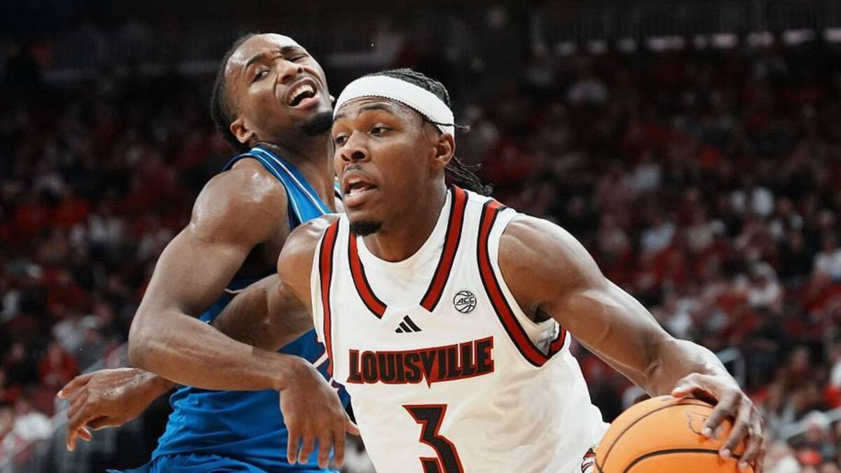  Louisville Cardinals guard Ryan Conwell (3) drives during the first half against visiting Kansas in the exhibition game at the KFC Yum! Center in Louisville, Kentucky Friday, October 24, 2025. | USA TODAY Network via Reuters Connect 