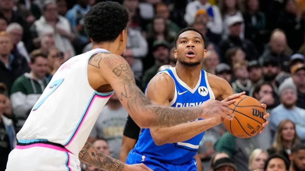  Feb 23, 2025; Milwaukee, Wisconsin, USA; Milwaukee Bucks forward Giannis Antetokounmpo (34) looks to shoot against Miami Heat center Kel'el Ware (7) during the first at Fiserv Forum. Mandatory Credit: Jeff Hanisch-Imagn Images | USA TODAY Sports via Reuters Connect 