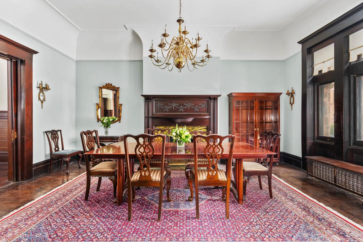  A dining room is shown at 842 Carroll Street. 