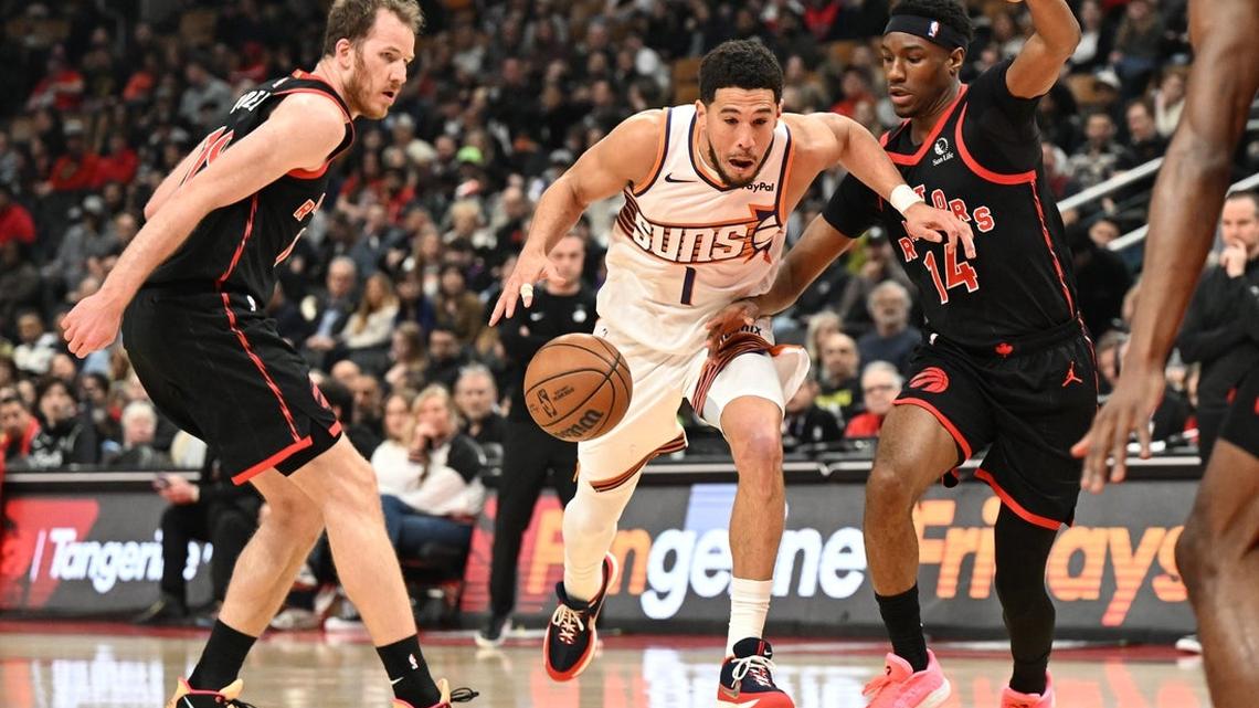 Raptors rally to knock off Suns 