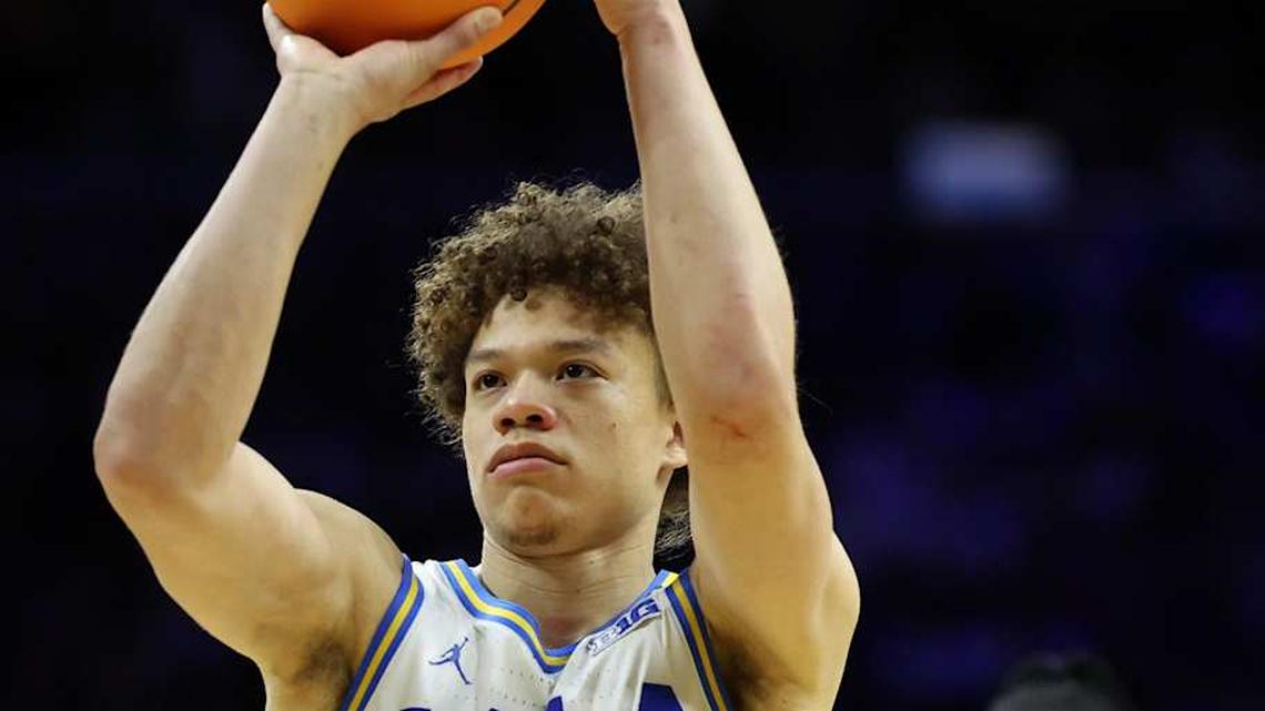  Mar 20, 2026; Philadelphia, PA, USA; UCLA Bruins guard Trent Perry (0) shoots the ball in the second half during a first round game of the men's 2026 NCAA Tournament at Xfinity Mobile Arena. Mandatory Credit: Bill Streicher-Imagn Images | Bill Streicher-Imagn Images 