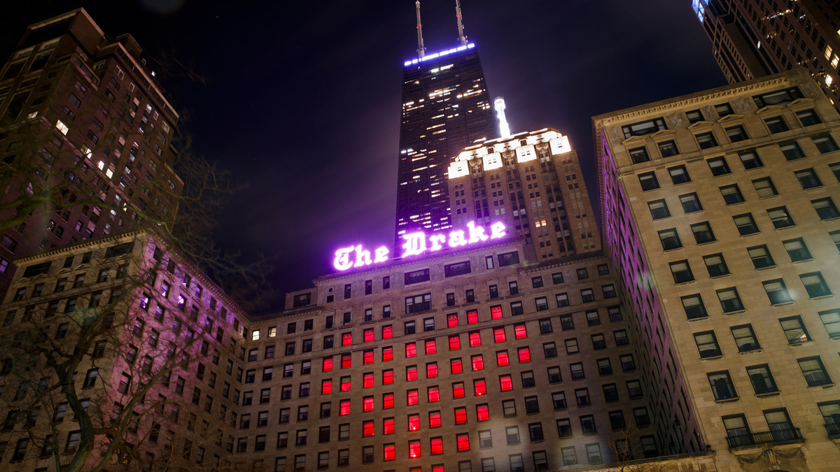 Red windows form a heart inside the Drake Hotel in support of the hospitality for hope initiative on April 20 in Chicago.