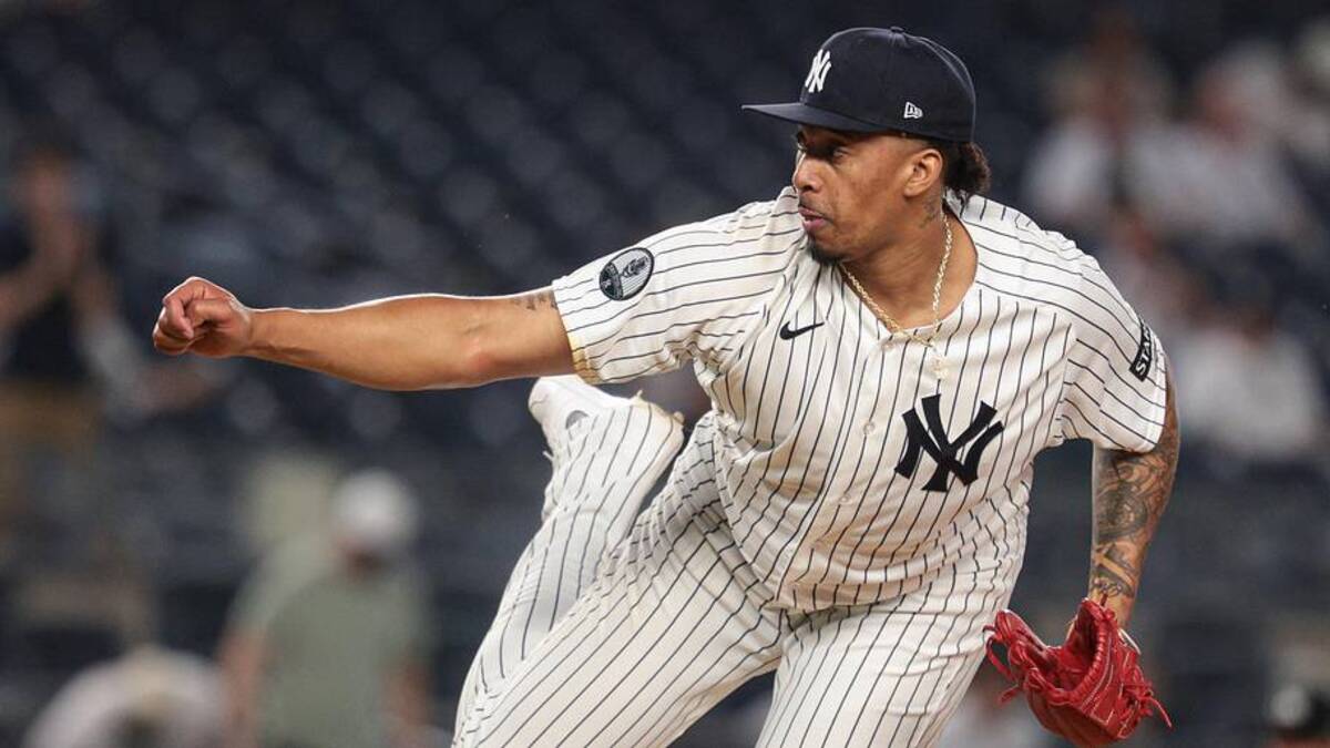  New York Yankees pitcher Yovanny Cruz (96) delivers a pitch against the Blue Jays in the ninth inning at Yankee Stadium. | Vincent Carchietta-Imagn Images 