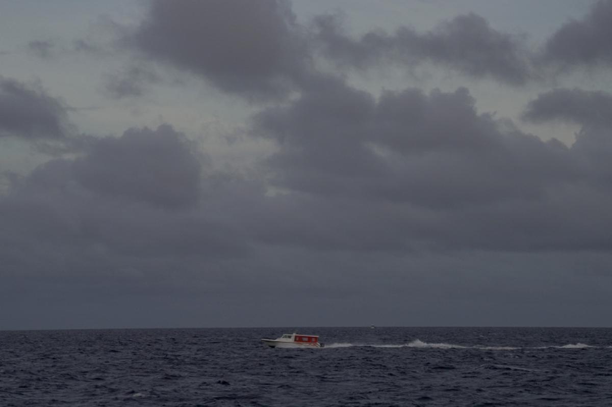 A speed boat moves in the waters of the Indian Ocean near Male, after a specialist team located the bodies of four missing Italian scuba divers who died in an accident in underwater caves, Maldives, May 18, 2026. REUTERS/Thilina Kaluthotage