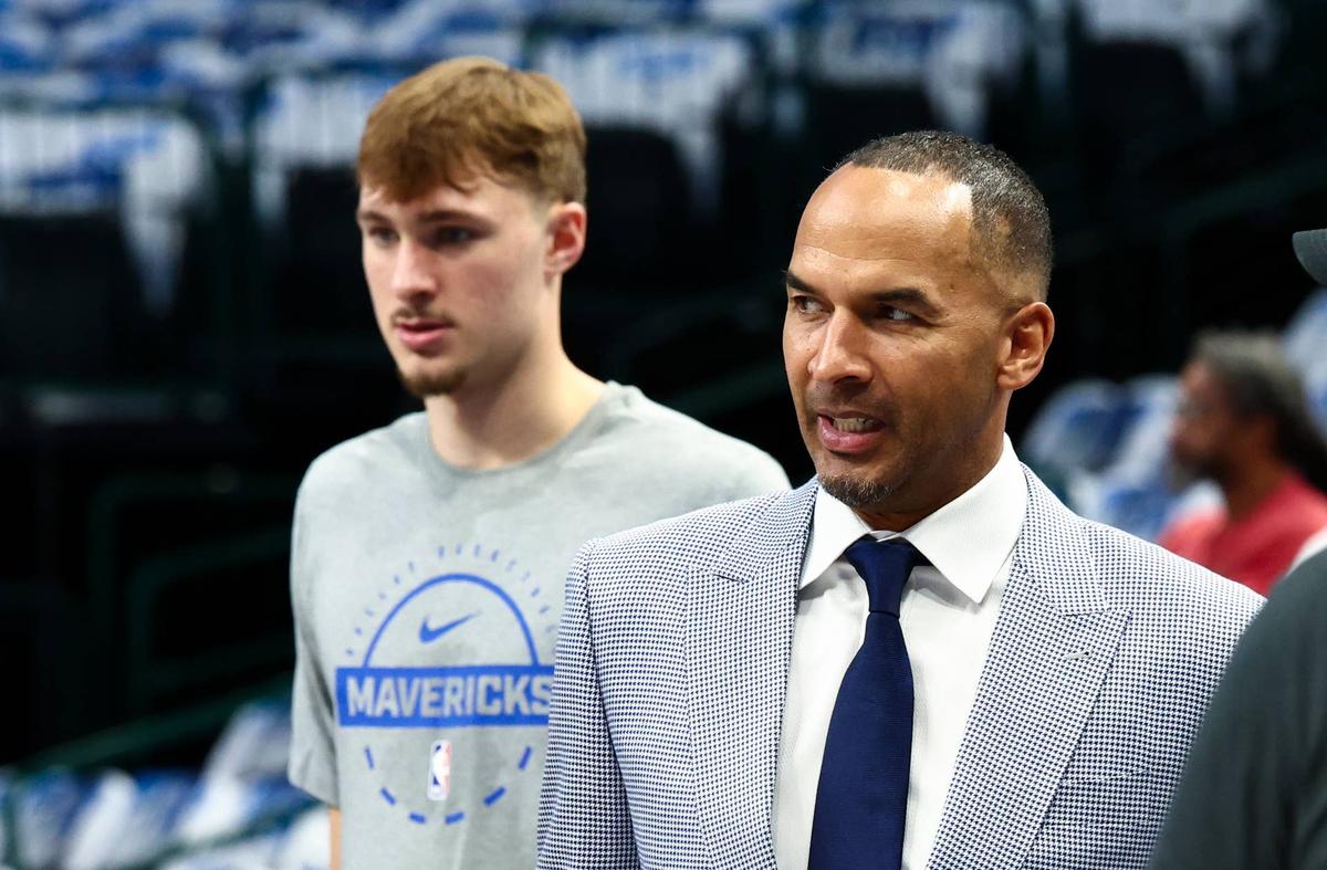  Former Dallas Mavericks general manager Nico Harrison and Dallas Mavericks forward Cooper Flagg (32) 