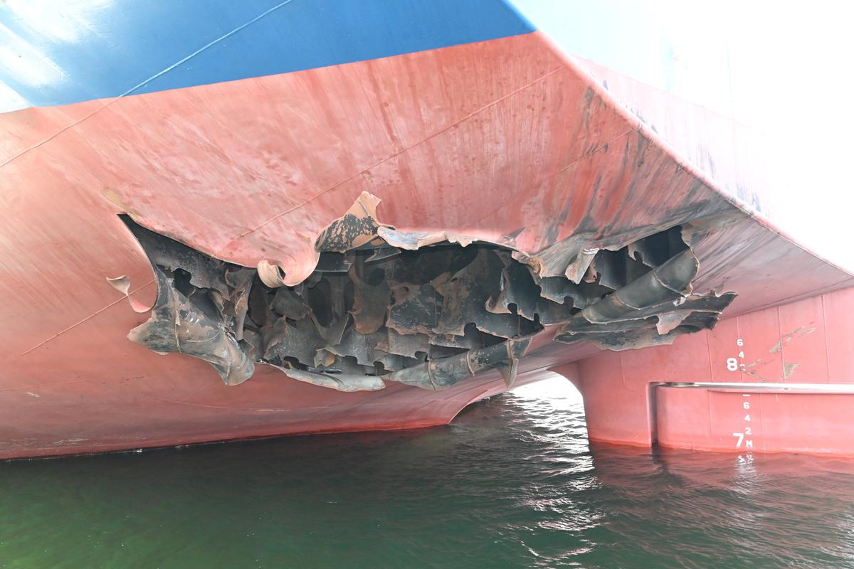 The damaged stern of a bulk carrier operated by South Korean shipper HMM, after it was struck by two unidentified objects on May 4 while stranded in the Strait of Hormuz, in this handout picture released on May 10, 2026. South Korean Foreign Ministry/Handout via REUTERS