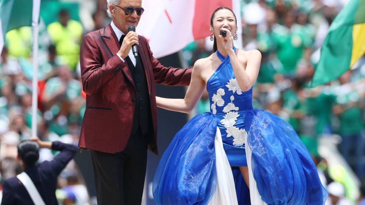 Italian tenor Andrea Bocelli and K-pop star EJAE perform the official FIFA World Cup anthem, "DNA" before the opening game of the 2026 World Cup between Mexico and South Africa at Aztec Stadium in Mexico City, Mexico, on Thursday, June 11, 2026. Photo by Christian Brunskill/UPI