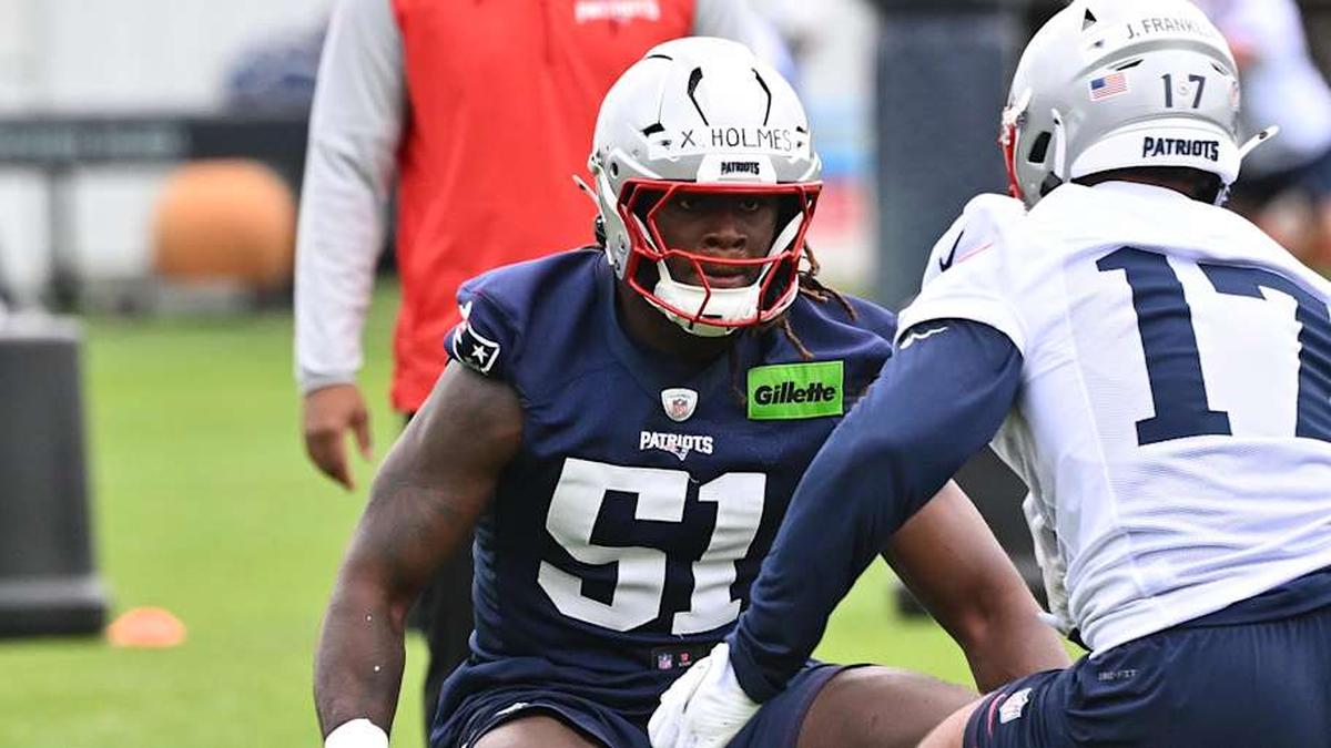  May 9, 2026; Foxborough, MA, USA; New England Patriots defensive end Xavier Holmes (51) does a drill with tight end Jeremiah Franklin (17) during the New England Patriots rookie camp at Gillette Stadium. Mandatory Credit: Eric Canha-Imagn Images | Eric Canha-Imagn Images 
