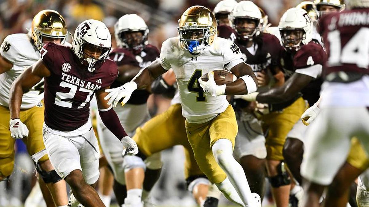  Aug 31, 2024; College Station, Texas, USA; Notre Dame Fighting Irish running back Jeremiyah Love (4) runs the ball for a touchdown in the fourth quarter against the Texas A&M Aggies at Kyle Field. | Maria Lysaker-Imagn Images 