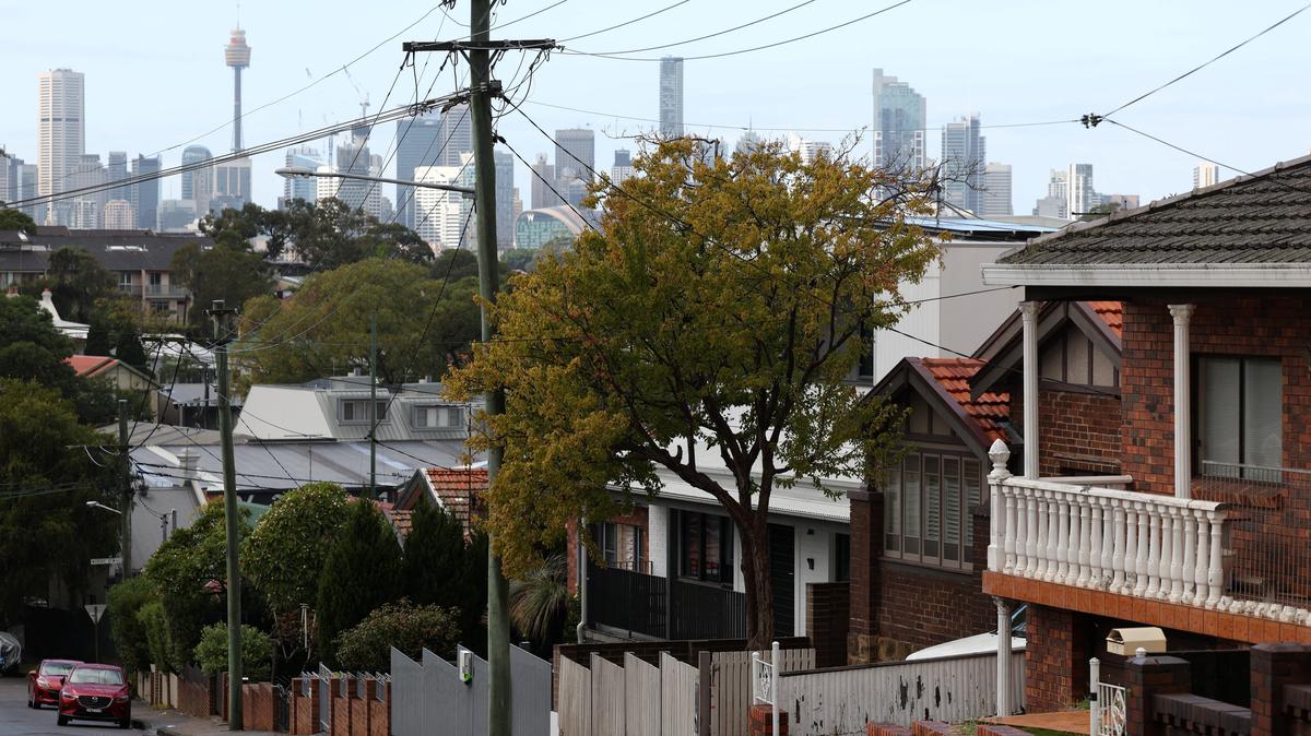 Residential properties stand in view of the city sklyine in Sydney, Australia, May 12, 2026. REUTERS/Hollie Adams