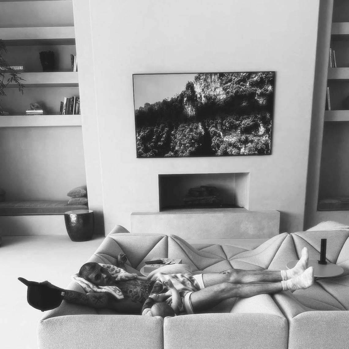 Relaxing With Dad Justin posted a black and white picture of himself lounging on the sofa with baby Jack. Courtesy of Justin Bieber/Instagram