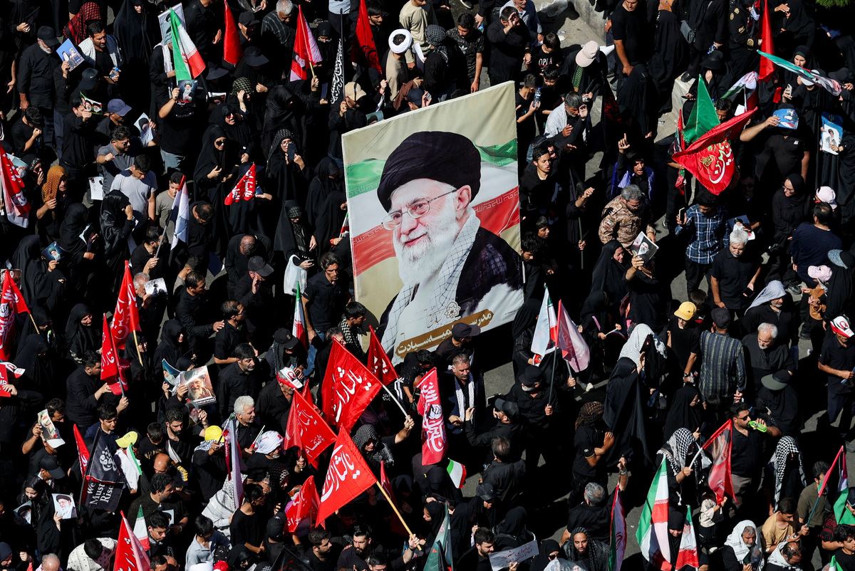 Portrait of Iran's late Supreme Leader Ayatollah Ali Khamenei, who was killed on February 28 in Israeli and U.S. airstrikes, as mourners gather on the day of his burial, in Mashhad, Iran, July 9, 2026. REUTERS/Mohammed Salem  Foreign media in Iran operate under guidelines set by the Ministry of Culture and Islamic Guidance, which regulates press activity and permissions.
