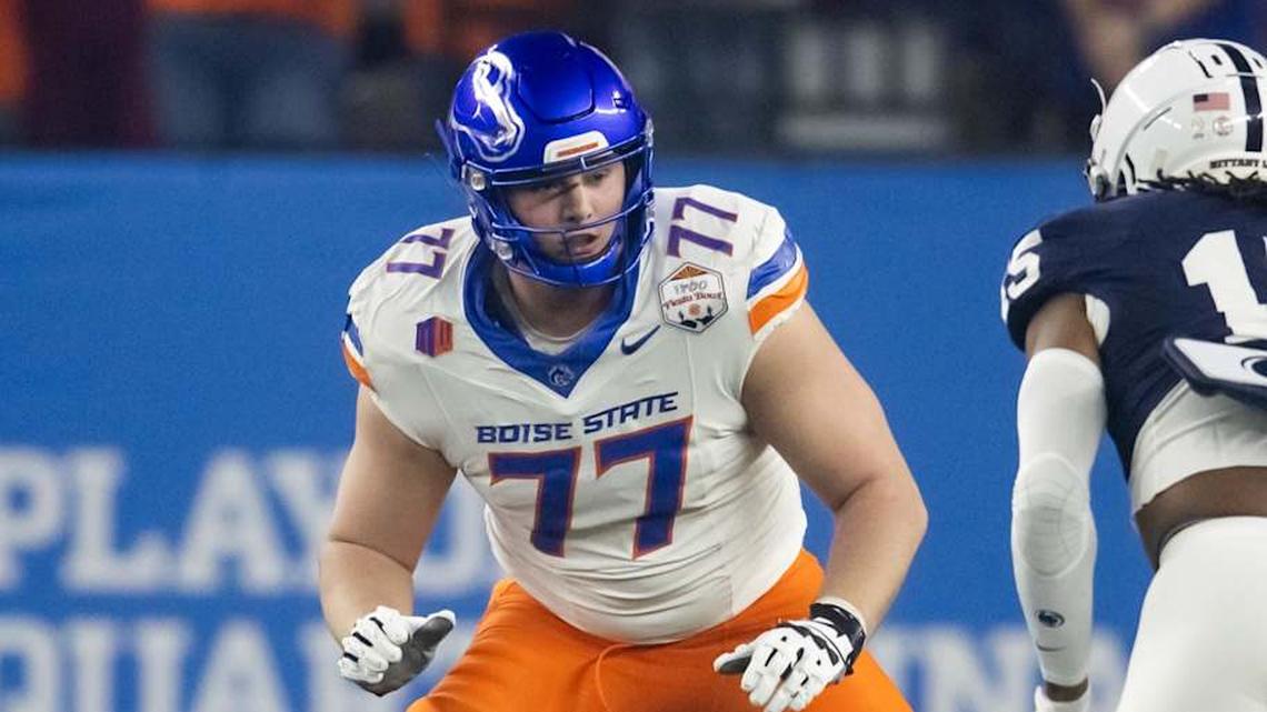  Dec 31, 2024; Glendale, AZ, USA; Boise State Broncos offensive tackle Kage Casey (77) against the Penn State Nittany Lions during the Fiesta Bowl at State Farm Stadium. Mandatory Credit: Mark J. Rebilas-Imagn Images | Mark J. Rebilas-Imagn Images 