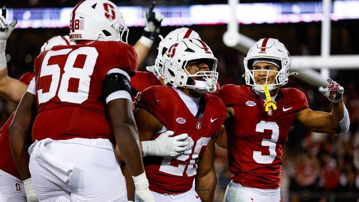  Nov 22, 2025; Stanford, California, USA; Stanford Cardinal running back Micah Ford (20) celebrates with teammates after scoring a touchdown during the fourth quarter against the California Golden Bears at Stanford Stadium. Mandatory Credit: Sergio Estrada-Imagn Images | Sergio Estrada-Imagn Images 