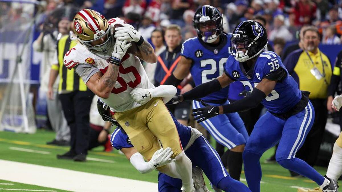  Dec 22, 2025; Indianapolis, Indiana, USA; Indianapolis Colts safety Cam Bynum (0) tackles San Francisco 49ers tight end George Kittle (85) in the third quarter of the game at Lucas Oil Stadium. Mandatory Credit: Trevor Ruszkowski-Imagn Images | Trevor Ruszkowski-Imagn Images 