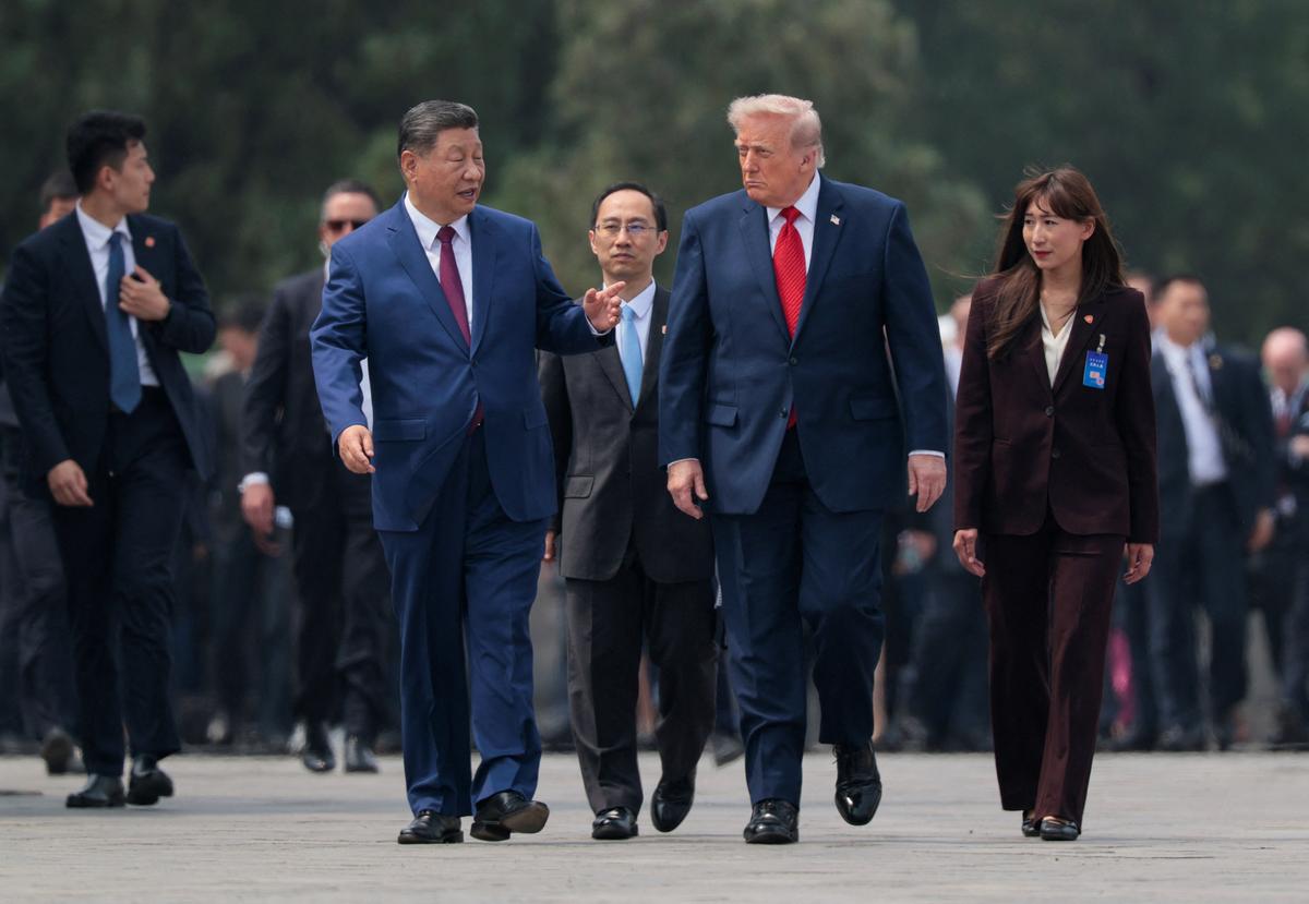 U.S. President Donald Trump and Chinese President Xi Jinping tour the Temple of Heaven in Beijing, China, May 14, 2026. REUTERS/Evan Vucci