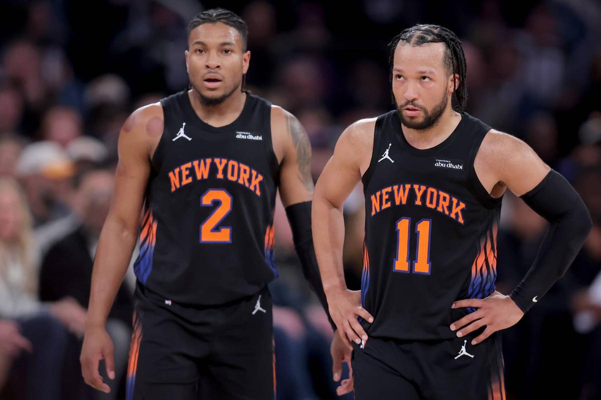  New York Knicks guards Miles McBride (2) and Jalen Brunson (11) react during the first quarter of game five of the first round of the 2026 NBA Playoffs against the Atlanta Hawks at Madison Square Garden. Brad Penner-Imagn Images