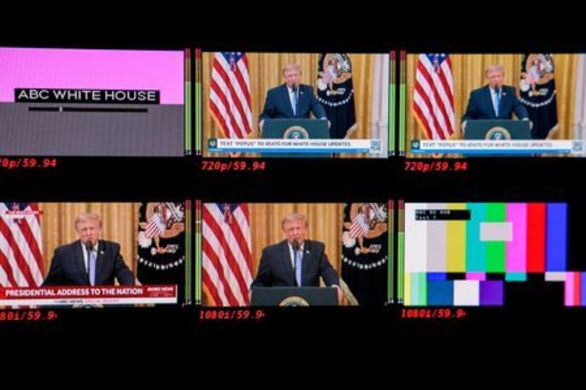 FILE PHOTO: Screens inside the James S. Brady Press Briefing Room of the White House display U.S. President Donald Trump speaking about election security during an address to the nation from the East Room of the White House, except for ABC and NBC, who chose to not air the address live on their primary platforms, in Washington, D.C., U.S., July 16, 2026. REUTERS/Kylie Cooper/File Photo