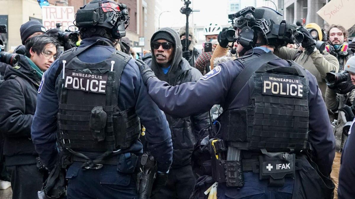 A protester confronts Minneapolis police after groups from competing protests confronted each other in downtown Minneapolis on January 17. Brian O'Hara, chief of the MPD, resigned Tuesday. File Photo by Craig Lassig/UPI