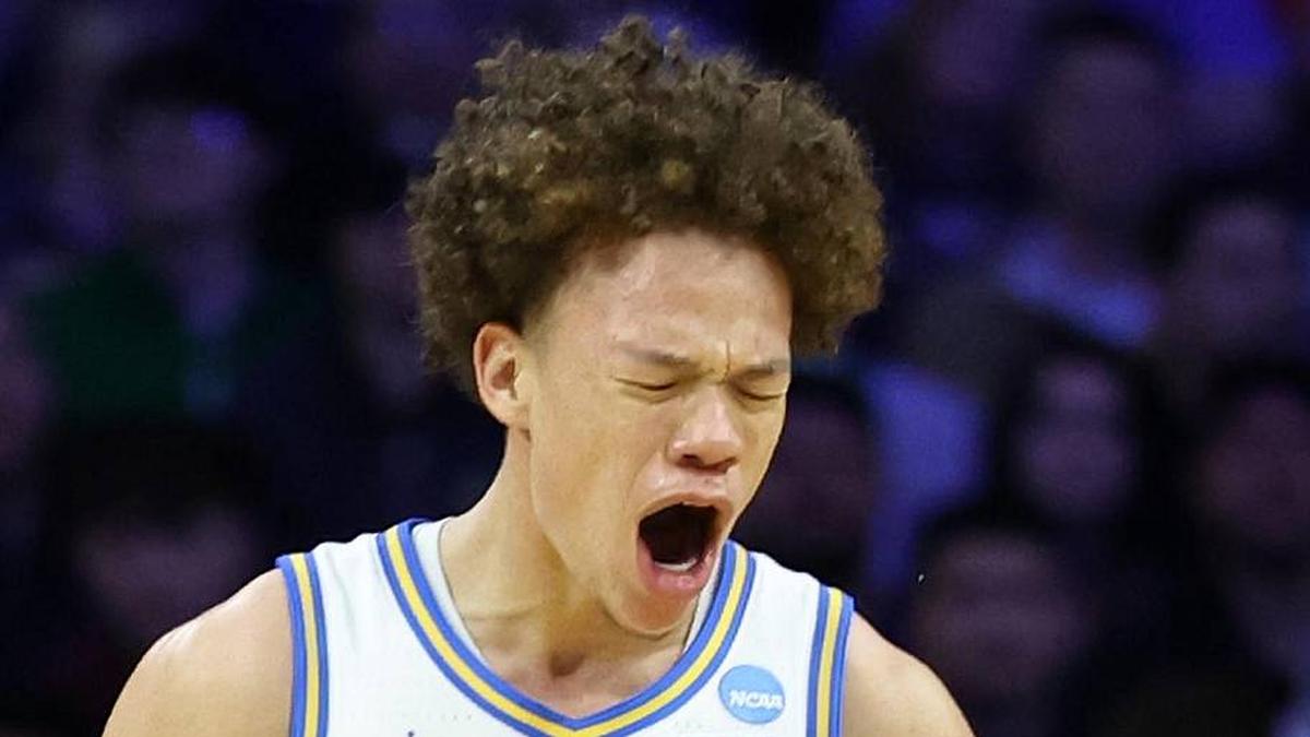  Mar 20, 2026; Philadelphia, PA, USA; UCLA Bruins guard Trent Perry (0) reacts with guard Eric Freeny (8) in the second half during a first round game of the men's 2026 NCAA Tournament at Xfinity Mobile Arena. Mandatory Credit: Bill Streicher-Imagn Images | Bill Streicher-Imagn Images 