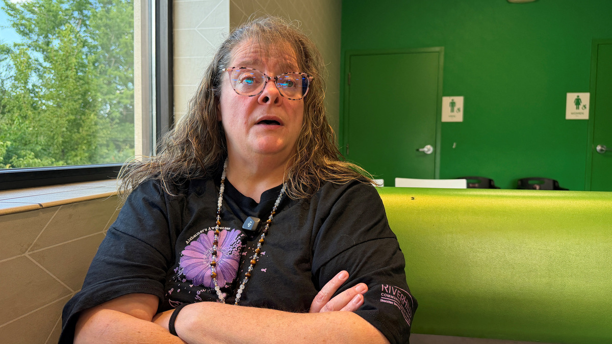 Shannon Gooden, a receptionist at the River Hills Community Health Center, poses for a picture during an interview in Centerville, Iowa, U.S., June 22, 2026. Picture taken with a mobile phone. REUTERS/Nathan Layne