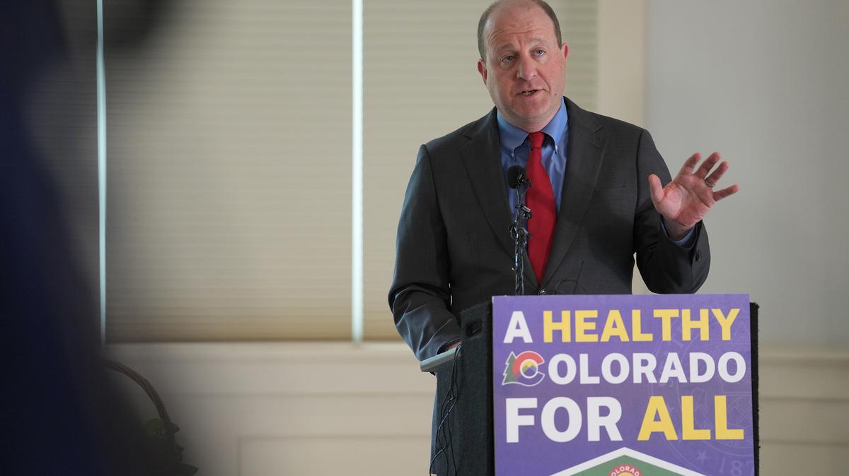 Colorado Gov. Jared Polis speaks during a news conference on the new “Healthy Colorado For All” initiative in the Governor’s Residence at the Boettcher Mansion in Denver on Thursday, May 21, 2026. He also took questions from the media about his recent commutation of Tina Peters' prison sentence. (Harmon Dobson/The Denver Post/TNS)