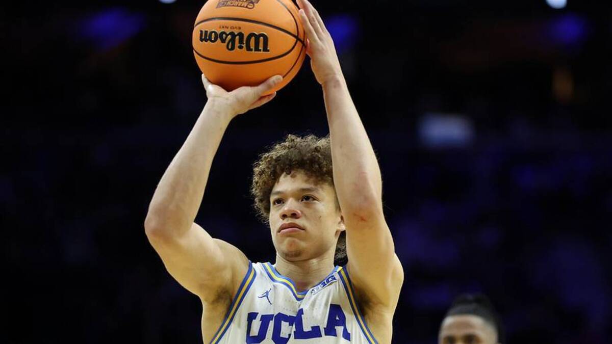  Mar 20, 2026; Philadelphia, PA, USA; UCLA Bruins guard Trent Perry (0) shoots the ball in the second half during a first round game of the men's 2026 NCAA Tournament at Xfinity Mobile Arena. Mandatory Credit: Bill Streicher-Imagn Images | Bill Streicher-Imagn Images 