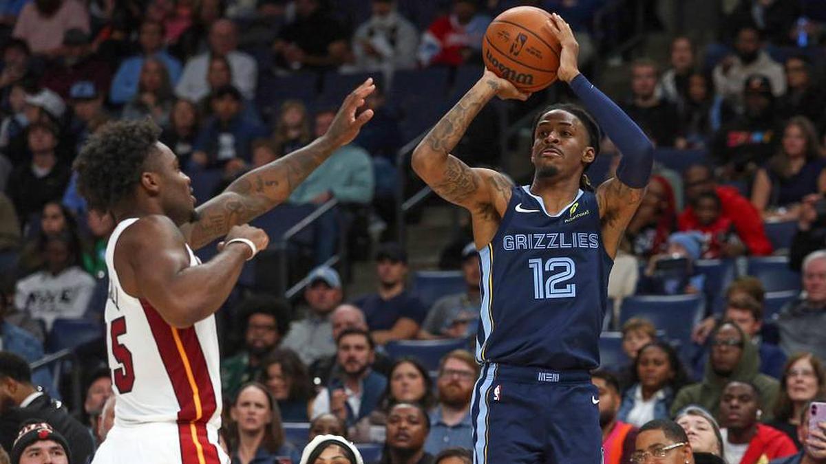  Oct 24, 2025; Memphis, Tennessee, USA; Memphis Grizzlies guard Ja Morant (12) shoots during the third quarter against the Miami Heat at FedExForum. Mandatory Credit: Petre Thomas-Imagn Images | Petre Thomas-Imagn Images 