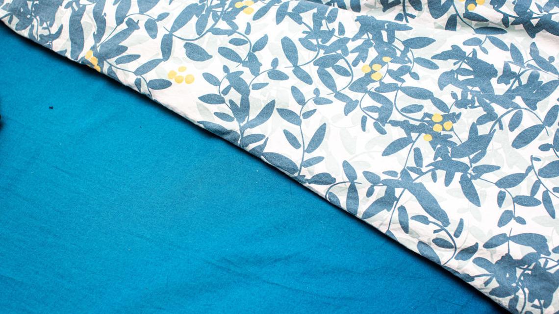 Cotton Sheets for Night Sweats: What Women Need To Know About How Bedding Affects Hot Flashes and Better Sleep