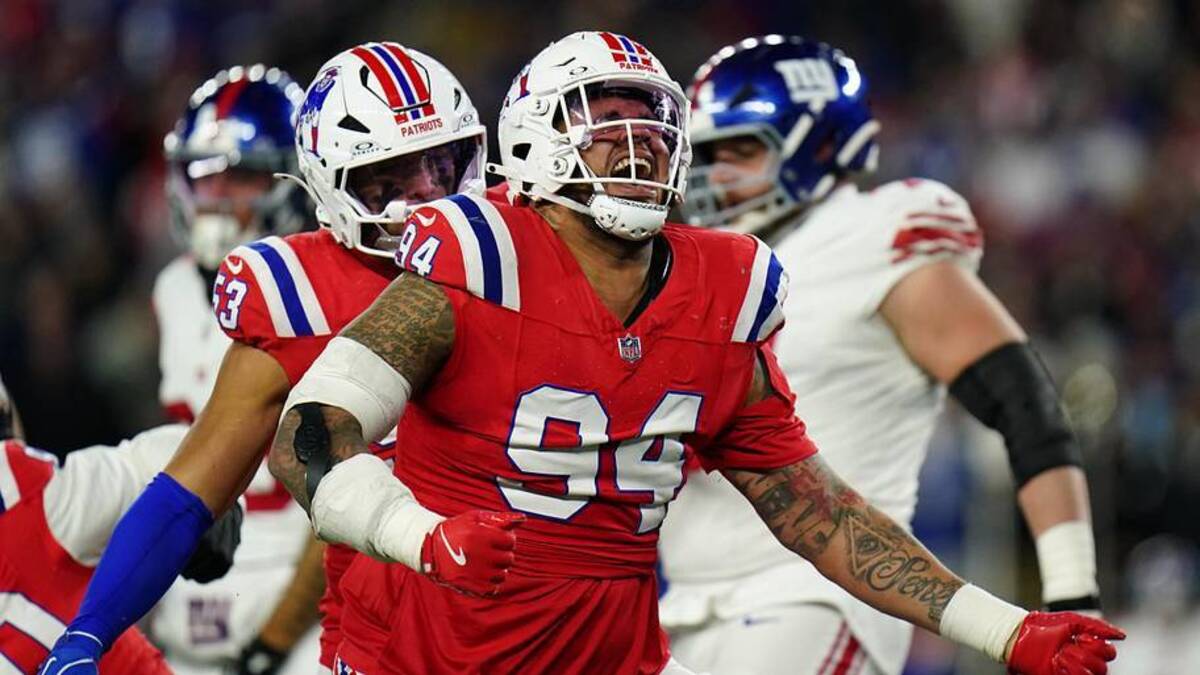  Dec 1, 2025; Foxborough, Massachusetts, USA; New England Patriots defensive tackle Cory Durden (94) celebrates after a play during the fourth quarter against the New York Giants at Gillette Stadium. Mandatory Credit: David Butler II-Imagn Images | David Butler II-Imagn Images 