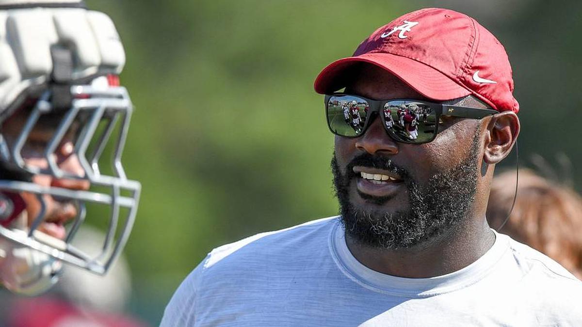  The Crimson Tide players and coaches continue working toward the season opener in practice Tuesday, Aug. 13, 2024. Alabama defensive line coach Freddie Roach works with his players. | Gary Cosby Jr.-Tuscaloosa News / USA TODAY NETWORK 