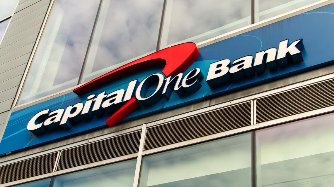 Capital One Bank logo seen from below. New York, USA. 11 10 2019. Sign located in the Harlem neighborhood, in the building at 301 W 125th Street.