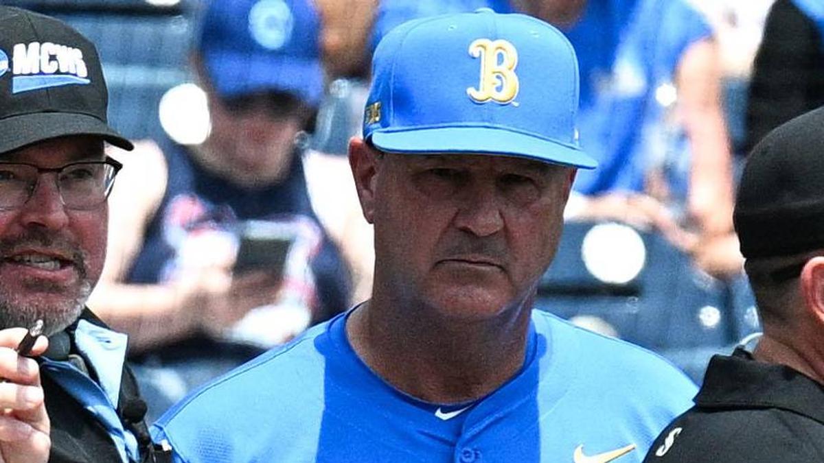  Jun 14, 2025; Omaha, Neb, USA; Murray State Racers head coach Dan Skirka and UCLA Bruins head coach John Savage meet with umpires before the game at Charles Schwab Field. Mandatory Credit: Steven Branscombe-Imagn Images | Steven Branscombe-Imagn Images 