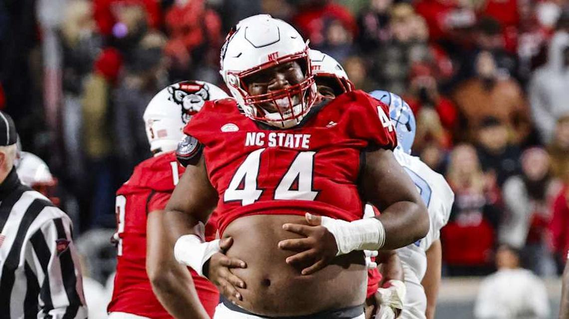  Nov 29, 2025; Raleigh, North Carolina, USA; NC State Wolfpack defensive tackle Brandon Cleveland (44) reacts to his tackle during the first half of the game against North Carolina Tar Heels at Carter-Finley Stadium. Mandatory Credit: Jaylynn Nash-Imagn Images | Jaylynn Nash-Imagn Images 