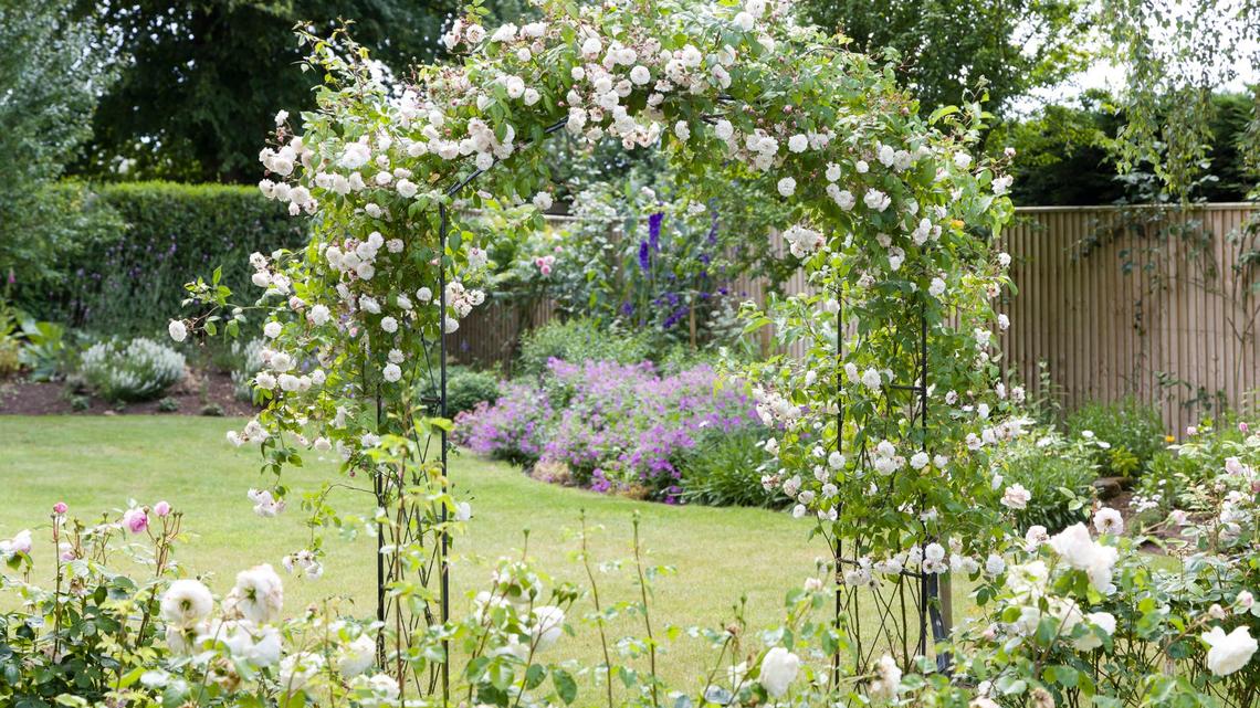 This DIYer Spent Less Than $40 to Create the Garden Arch of Her Dreams, and the Result Is Pure Magic 