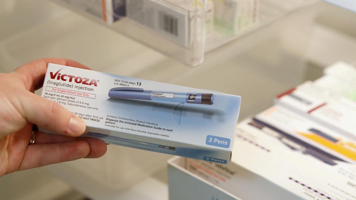 FILE PHOTO: A pharmacist holds a box of the drug Victoza, made by Novo Nordisk Pharmaceutical, at a pharmacy in Provo, Utah, U.S. January 9, 2020.   REUTERS/George Frey/File Photo