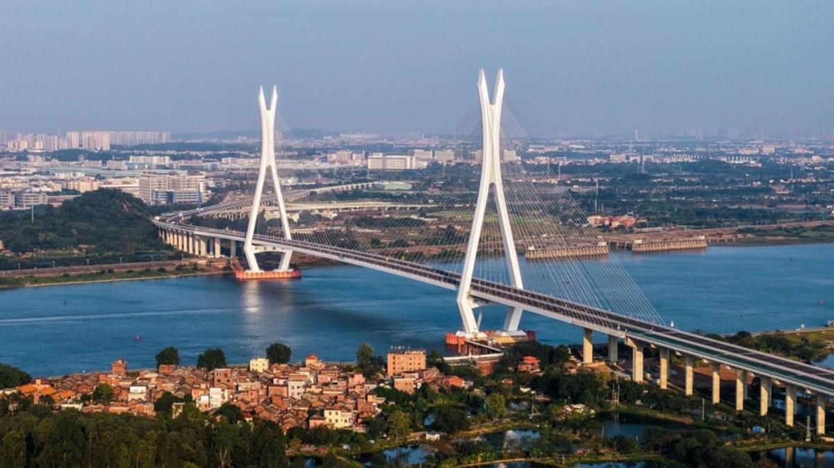 An aerial view taken with a drone shows the Fulong Xijiang super major bridge in Foshan, south China's Guangdong Province. Photo by LIU DAWEI / XINHUA / EPA