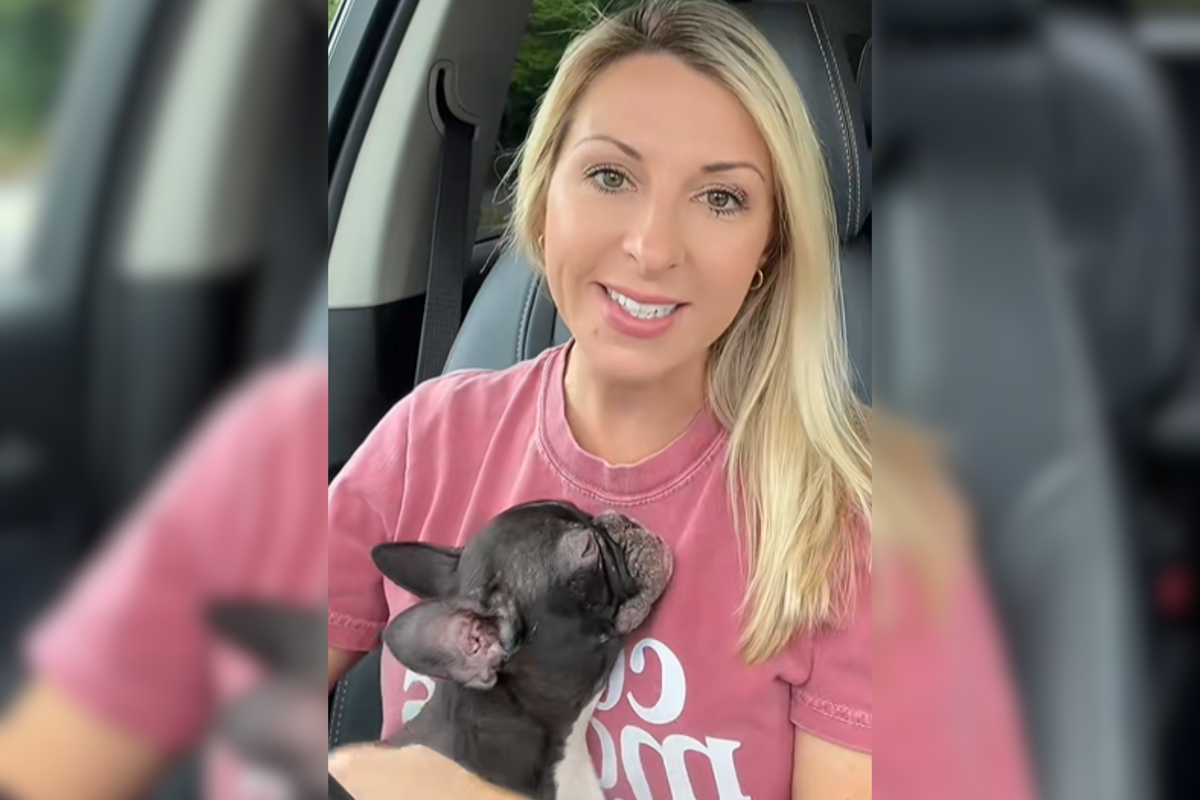  Crystal Floyd, 42, holding Indy in her arms. 