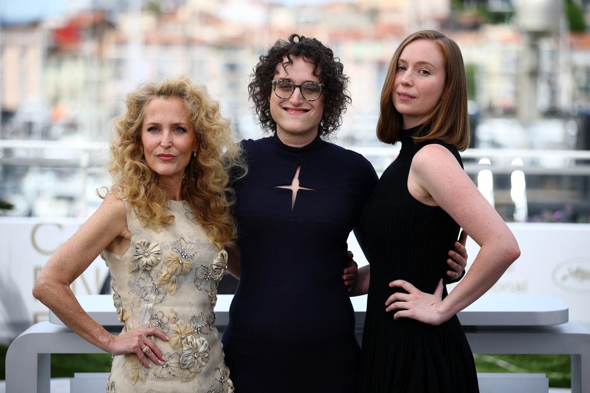 Director Jane Schoenbrun and  cast members Gillian Anderson and Hannah Einbinder pose during a photocall for the film  "Teenage Sex and Death at Camp Miasma" presented in the category Un Certain Regard at the 79th Cannes Film Festival in Cannes, France, May 13, 2026. REUTERS/Sarah Meyssonnier