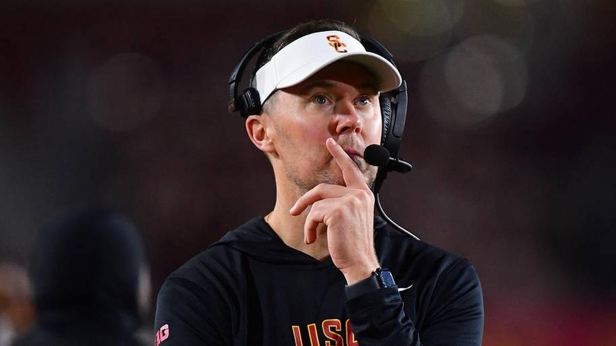  Nov 7, 2025; Los Angeles, California, USA; Southern California Trojans head coach Lincoln Riley watches game action against the Northwestern Wildcats during the second half at the Los Angeles Memorial Coliseum. Mandatory Credit: Gary A. Vasquez-Imagn Images | Gary A. Vasquez-Imagn Images 