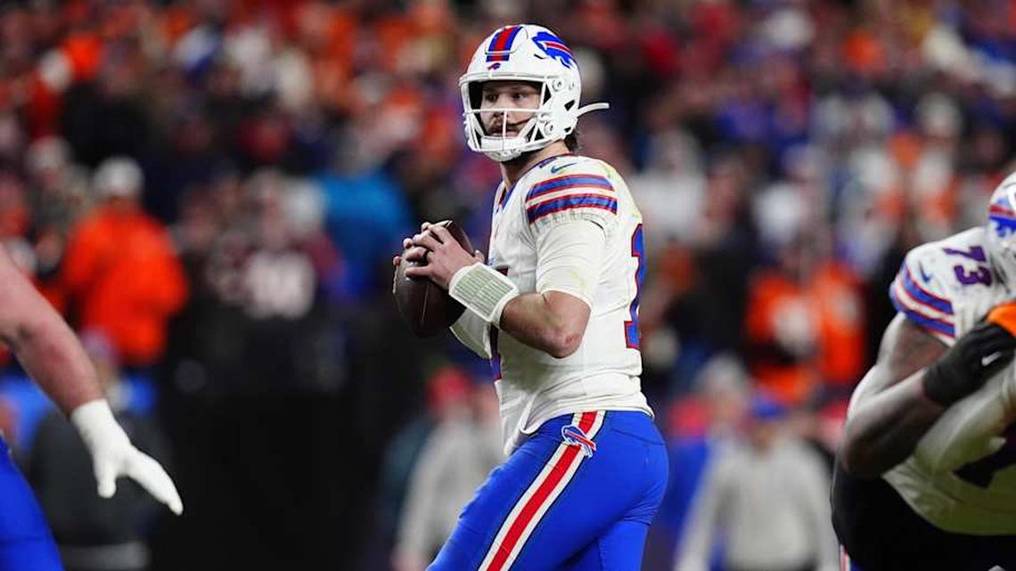  Jan 17, 2026; Denver, CO, USA; Buffalo Bills quarterback Josh Allen (17) drops to throw during the fourth quarter of an AFC Divisional Round playoff game against the Denver Broncos at Empower Field at Mile High. | Ron Chenoy-Imagn Images 