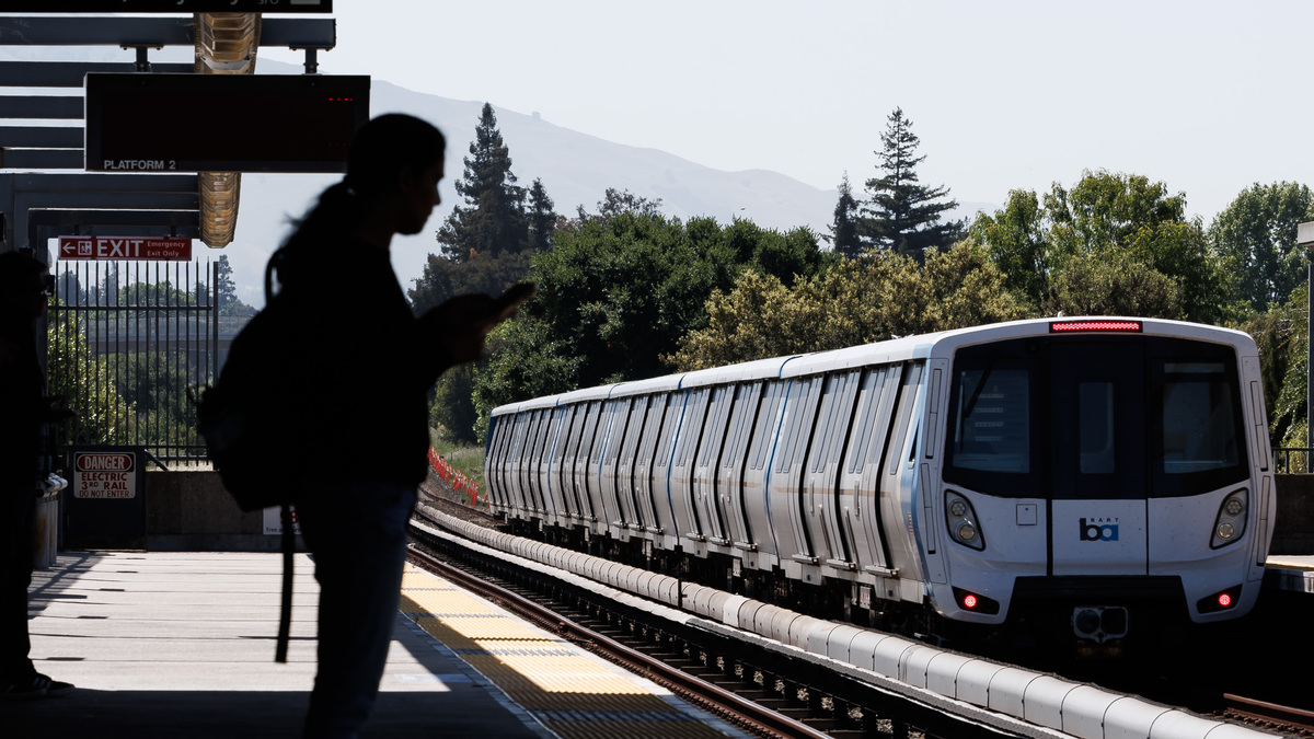 A passenger waits at the platform at the Union City BART station after an early morning, system-wide shutdown on Friday, May 9, 2025, in Union City, Calif. BART services were restored around 9:20 a.m. with limited service and delays. (Dai Sugano/Bay Area News Group)