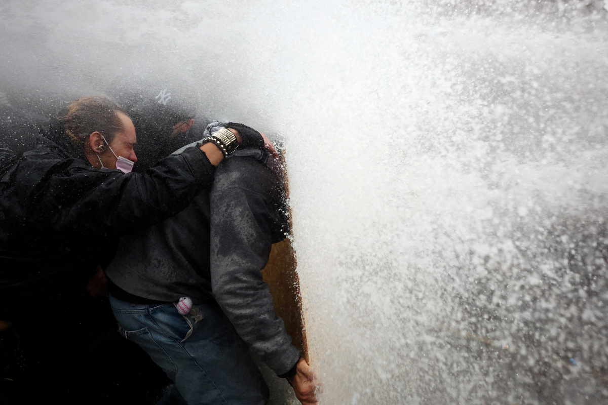 Violence flares in Paris after largely peaceful protests across France ...