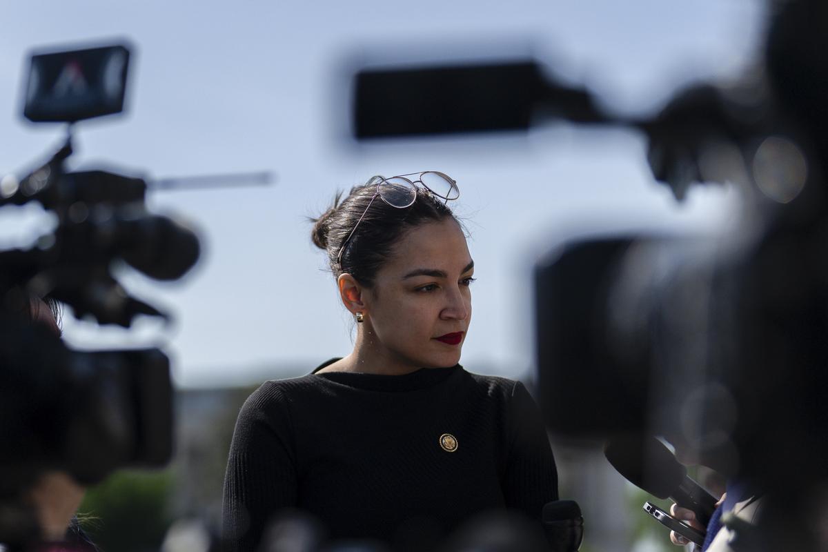 FILE --Rep. Alexandria Ocasio-Cortez (D-N.Y.) speaks to reporters on Capitol Hill in Washington, on April 23, 2026. "If Republicans are going to redraw North Carolina, if they're going to redraw Texas, if they're going to redraw and gerrymander every one of their states, then unfortunately we have to provide balance to that until we get to the day when we can all finally agree to put this behind us," she said. (Tierney L. Cross/The New York Times)