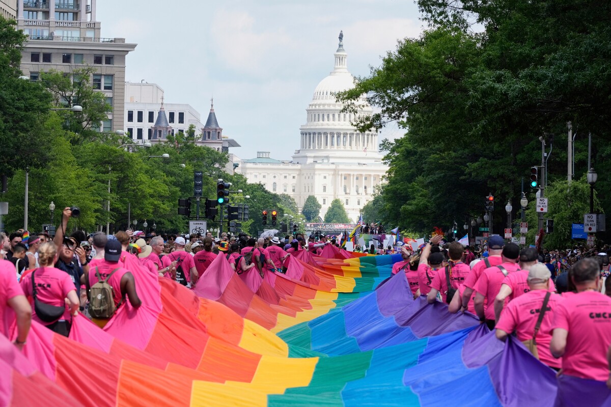  Participants carry a large LGBTQ+ pride flag during the World Pride parade in Washington, D.C., on June 7, 2025. 